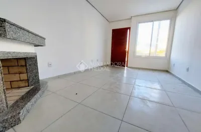 Casa em condomínio fechado com 2 quartos à venda na rua eroni soares machado, 473, hípica, porto alegre, 90 m2 por r$ 389.000