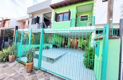 Casa em condomínio fechado com 3 quartos à venda na rua pau brasil, 549, hípica, porto alegre, 134 m2 por r$ 550.000