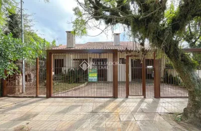 Casa com 3 quartos à venda na avenida ararangua, 126, guarujá, porto alegre, 210 m2 por r$ 430.000