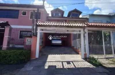 Casa com 3 quartos à venda na rua james bocacio, 116, hípica, porto alegre, 123 m2 por r$ 450.000