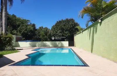 Casa com 4 quartos à venda na rua guilherme grovermann, 825, rondônia, novo hamburgo, 222 m2 por r$ 998.000