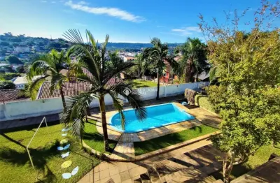 Casa com 7 quartos à venda na rua piauí, 393, rincão, novo hamburgo, 412 m2 por r$ 1.064.000