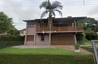 Casa com 4 quartos à venda na rua tubarão, 433, primavera, novo hamburgo, 267 m2 por r$ 790.000