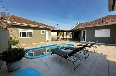 Casa com 4 quartos à venda na porto alegre, 443, praia paraíso, torres, 280 m2 por r$ 960.000