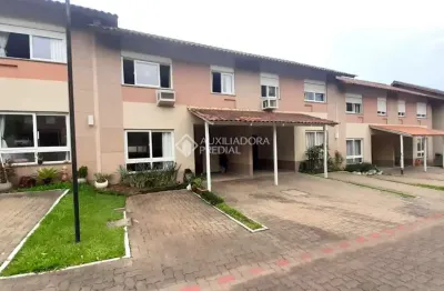 Casa em condomínio fechado com 3 quartos à venda na rua guia lopes, 968, rondônia, novo hamburgo, 121 m2 por r$ 590.000