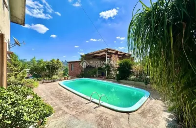 Casa com 4 quartos à venda na rua guilherme vielitz, 467, canudos, novo hamburgo, 220 m2 por r$ 585.000