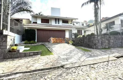 Casa com 4 quartos à venda na rua itapiru, 104, guarani, novo hamburgo, 245 m2 por r$ 950.000