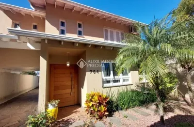 Casa com 3 quartos à venda na rua caçador, 764, ideal, novo hamburgo, 231 m2 por r$ 1.250.000
