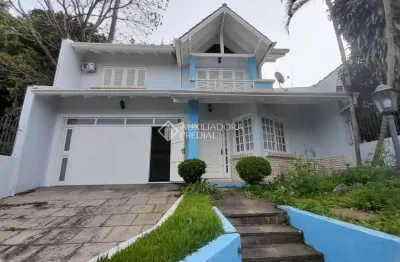 Casa com 3 quartos à venda na rua caçador, 745, ideal, novo hamburgo, 187 m2 por r$ 650.000