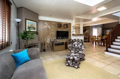 Casa em condomínio fechado com 3 quartos à venda na estrada martin luther, 700, lomba grande, novo hamburgo, 300 m2 por r$ 980.000