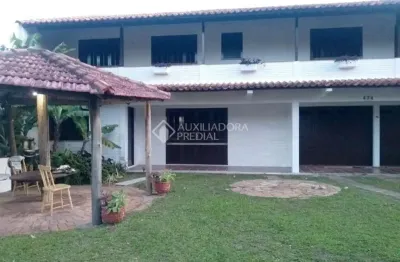 Casa em condomínio fechado com 4 quartos à venda na primeiro de marco, 474, centro, tramandaí, 249 m2 por r$ 480.000