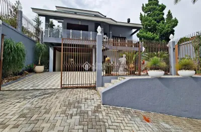 Casa em condomínio fechado com 4 quartos à venda na rua itaqui, 173, imigrante norte, campo bom, 265 m2 por r$ 1.100.000