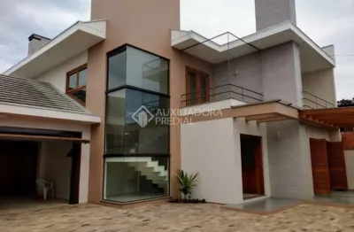 Casa em condomínio fechado com 3 quartos à venda na albano hansen, 1542, travessão, dois irmãos, 238 m2 por r$ 1.140.000