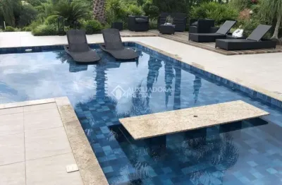 Casa em condomínio fechado com 5 quartos à venda na rua holanda, 151, lago azul, estância velha, 470 m2 por r$ 3.800.000