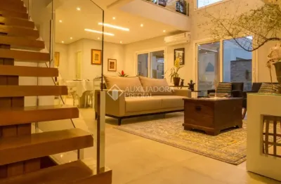 Casa em condomínio fechado com 3 quartos à venda na rua joão pedro schimitt, 715, rondônia, novo hamburgo, 181 m2 por r$ 1.075.000
