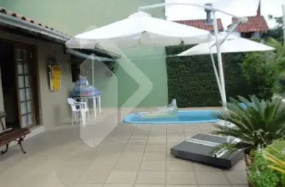 Casa em condomínio fechado com 3 quartos à venda na rua prudente de moraes, 421, guarani, novo hamburgo, 180 m2 por r$ 650.000