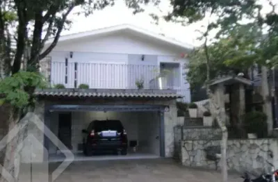 Casa em condomínio fechado com 3 quartos à venda na rua gomes portinho, 902, centro, novo hamburgo, 191 m2 por r$ 900.000