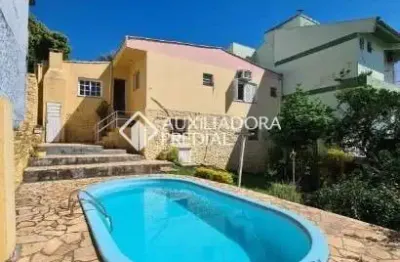 Casa em condomínio fechado com 3 quartos à venda na rua gramado, 916, ouro branco, novo hamburgo, 133 m2 por r$ 550.000