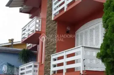 Casa em condomínio fechado com 3 quartos à venda na rua osvaldo cruz, 1473, primavera, novo hamburgo, 399 m2 por r$ 890.000