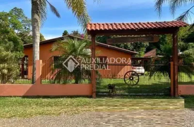 Casa em condomínio fechado com 3 quartos à venda na rs 040 - parada 90, 1265, águas claras, viamão, 300 m2 por r$ 600.000