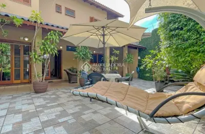 Casa com 4 quartos à venda na Rua Moema, 547, Chácara das Pedras, Porto Alegre, 313 m2 por R$ 2.177.000