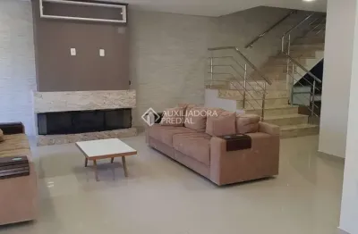 Casa em condomínio fechado com 4 quartos à venda na rua doutor jorge fayet, 693, chácara das pedras, porto alegre, 379 m2 por r$ 2.979.000