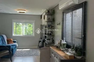 Casa em condomínio fechado com 3 quartos à venda na Avenida Mendanha, 500, Centro, Viamão, 130 m2 por R$ 749.000