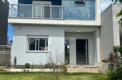 Casa em condomínio fechado com 3 quartos à venda na avenida mendanha, 500, centro, viamão, 130 m2 por r$ 750.000