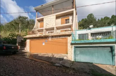 Casa com 4 quartos à venda na rua professor luiz antônio lopes, 530, morro santana, porto alegre, 429 m2 por r$ 850.000