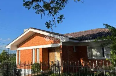 Casa com 3 quartos à venda na rua açores, 377, tarumã, viamão, 422 m2 por r$ 1.200.000