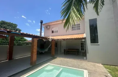 Casa com 3 quartos à venda na rua telmo vieira de araújo, 297, hípica, porto alegre, 142 m2 por r$ 689.000