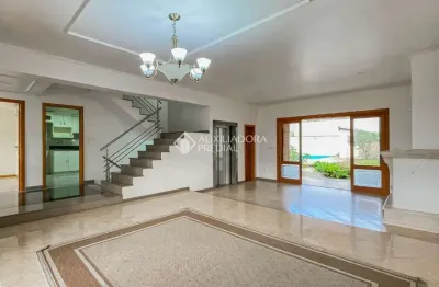 Casa em condomínio fechado com 3 quartos à venda na Rua Licínio Cardoso, 305, Chácara das Pedras, Porto Alegre, 548 m2 por R$ 2.510.000