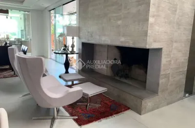 Casa em condomínio fechado com 3 quartos à venda na avenida juca batista, 9000, cavalhada, porto alegre, 339 m2 por r$ 4.200.000