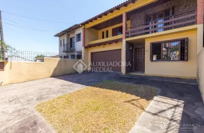 Casa em condomínio fechado com 3 quartos à venda na avenida ipê, 298, vila jardim, porto alegre, 192 m2 por r$ 900.000