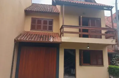 Casa em condomínio fechado com 3 quartos à venda na orleans, 105, guarujá, porto alegre, 207 m2 por r$ 435.000