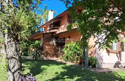 Casa com 4 quartos à venda na rua itapitocaí, 725, cristal, porto alegre, 365 m2 por r$ 1.599.000