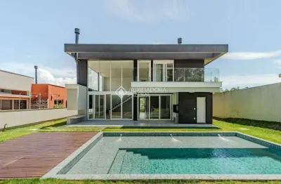 Casa em condomínio fechado com 4 quartos à venda na estrada das três meninas, 2000, vila nova, porto alegre, 292 m2 por r$ 2.490.000