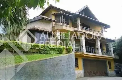 Casa em condomínio fechado com 4 quartos à venda na avenida coronel marcos, 96, pedra redonda, porto alegre, 460 m2 por r$ 2.400.000