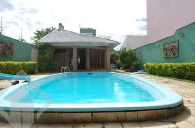 Casa em condomínio fechado com 4 quartos à venda na rua dulcimar cardoso, 340, paraíso, sapucaia do sul, 340 m2 por r$ 1.060.000