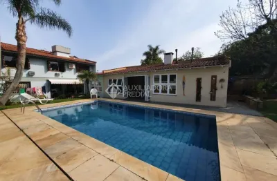 Casa em condomínio fechado com 4 quartos à venda na travessa pedra redonda, 130, jardim isabel, porto alegre, 500 m2 por r$ 2.200.000