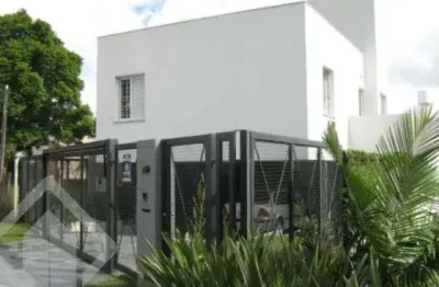 Casa em condomínio fechado com 4 quartos à venda na rua alcebíades antônio dos santos, 355, nonoai, porto alegre, 465 m2 por r$ 1.710.000