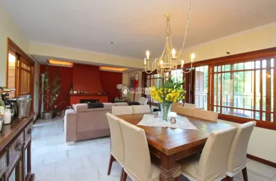 Casa com 3 quartos à venda na rua condado, 29, cavalhada, porto alegre, 270 m2 por r$ 1.380.000