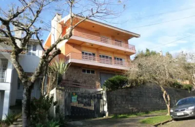 Casa com 4 quartos à venda na rua caeté, 1047, vila assunção, porto alegre, 323 m2 por r$ 1.800.000