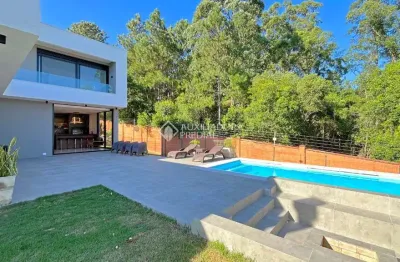 Casa em condomínio fechado com 4 quartos à venda na estrada das três meninas, 2000, vila nova, porto alegre, 340 m2 por r$ 3.100.000