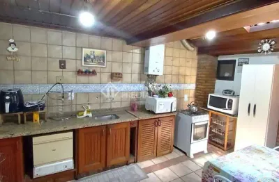 Casa em condomínio fechado com 3 quartos à venda na avenida juca batista, 1490, cavalhada, porto alegre, 122 m2 por r$ 650.000