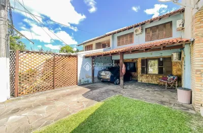 Casa em condomínio fechado com 3 quartos à venda na Avenida Juca Batista, 1490, Cavalhada, Porto Alegre, 122 m2 por R$ 400.000