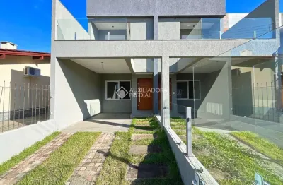 Casa em condomínio fechado com 3 quartos à venda na rua itacyr rossi, 31, guarujá, porto alegre, 122 m2 por r$ 560.000