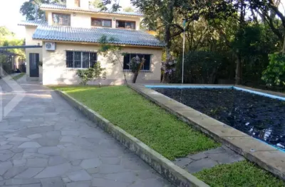 Casa em condomínio fechado com 3 quartos à venda na rua doutor cecílio monza, 10662, belém novo, porto alegre, 476 m2 por r$ 1.350.000