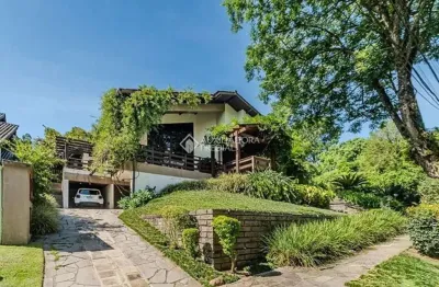 Casa em condomínio fechado com 4 quartos à venda na avenida firmino octávio bimbi, 255, cavalhada, porto alegre, 300 m2 por r$ 2.300.000