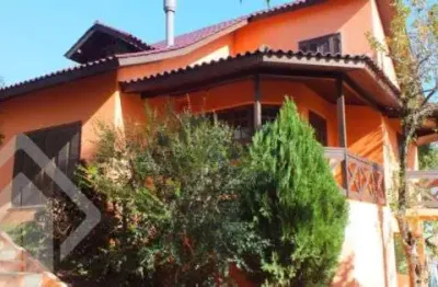 Casa em condomínio fechado com 3 quartos à venda na avenida vicente monteggia, 1669, cavalhada, porto alegre, 121 m2 por r$ 650.000